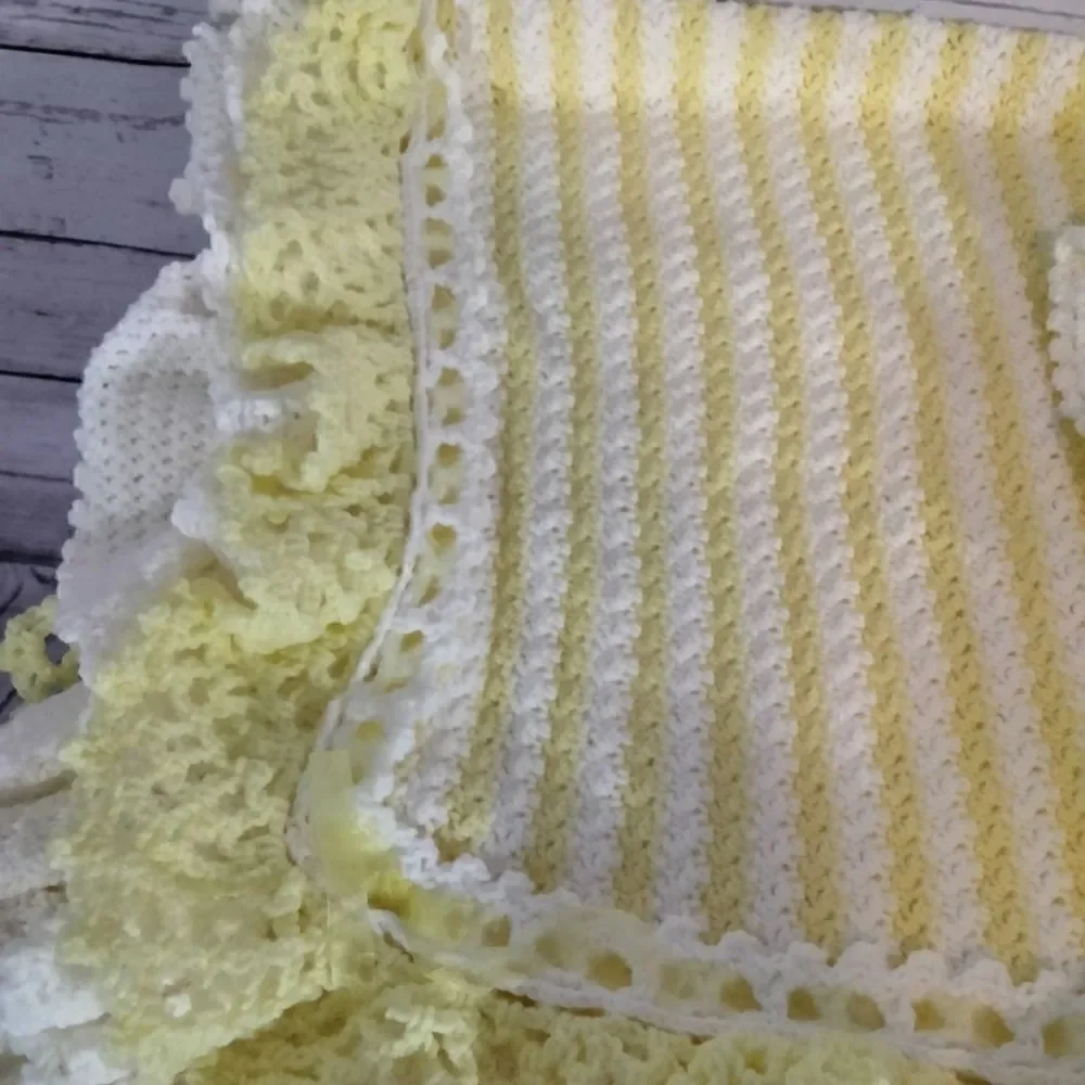 Never been used.  ( my mom) homemade baby blanket.